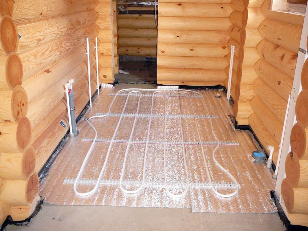 Vodné podlahové kúrenie, ako alternatíva ku klasickej schéme vykurovania v drevenom dome